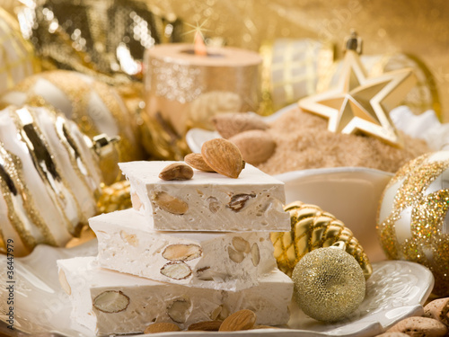 Canvas Print almond nougat over christmas table