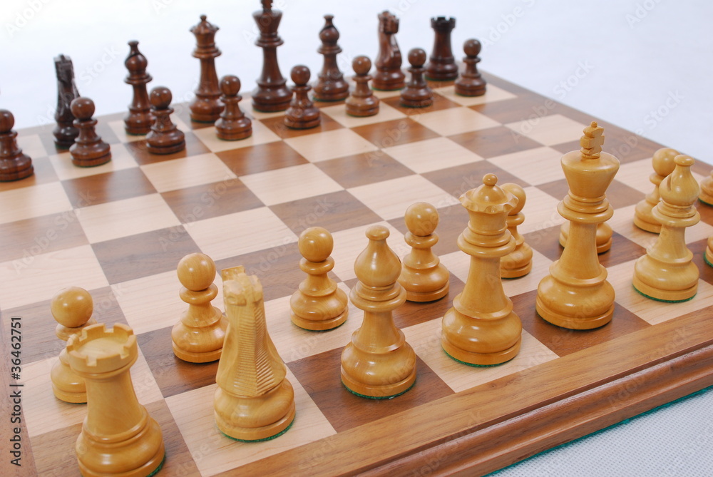 chess pieces on white chess pieces on white