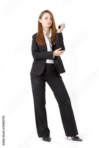 Beautiful business woman using a smart phone