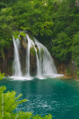 Beautiful waterfall in lush surroundings.
