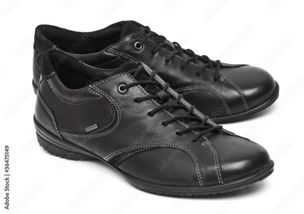 A pair of woman's sport shoes isolated on the white background A pair of woman's sport shoes isolated on the white background