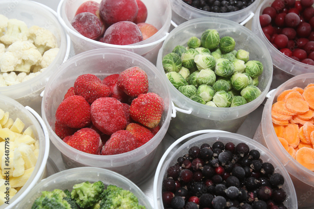 Frozen fruits and vegetables in plastic containers