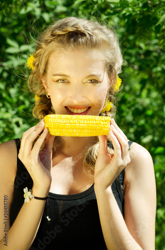 woman eating corn-cob
