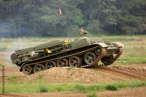 offroad scenery with driving tank photo