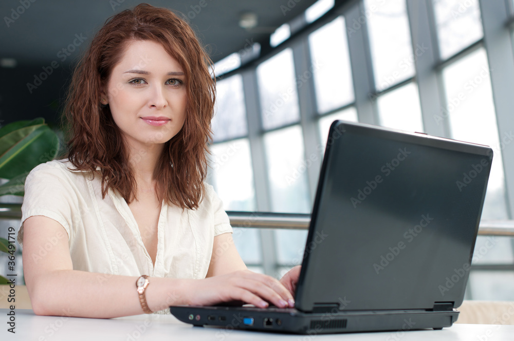 Young business woman with laptop Young business woman with laptop