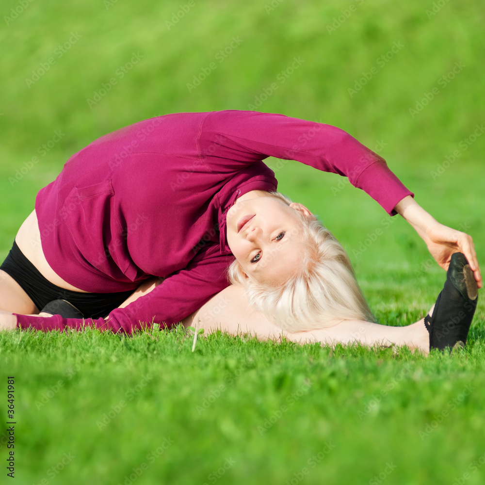 Beautiful woman doing yoga stretching exercise Beautiful woman doing yoga stretching exercise