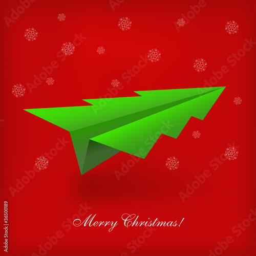 Concept of the Christmas tree and origami airplane