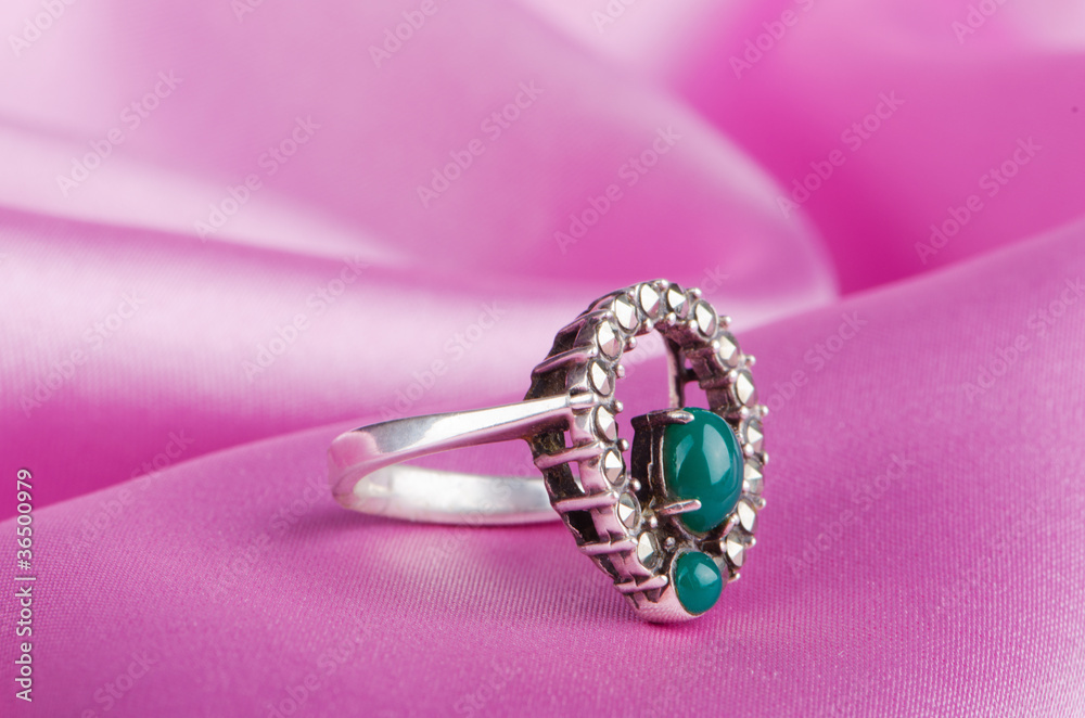 Jewellery ring on the satin background Jewellery ring on the satin background