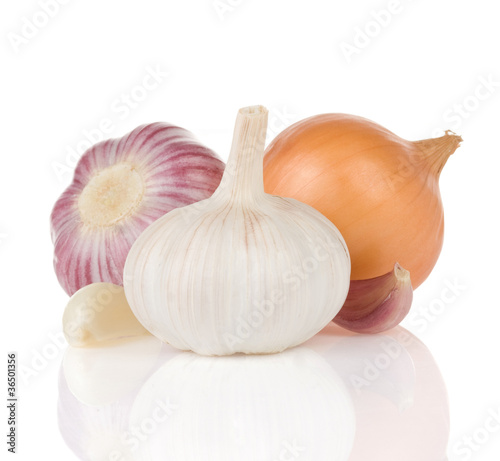 garlics and onion isolated on white