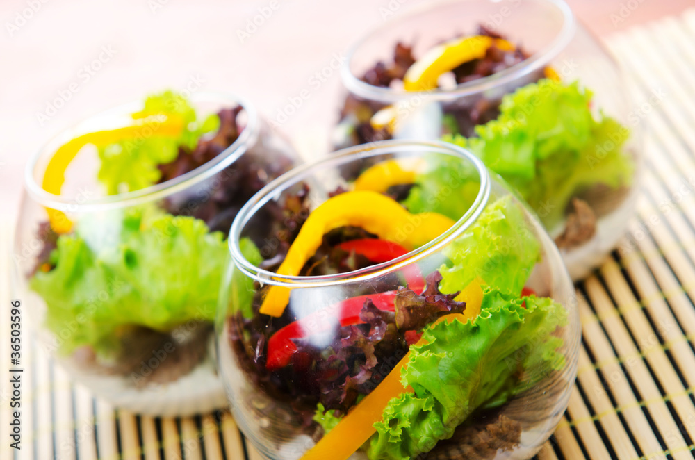 Fresh healthy salad in bowls Fresh healthy salad in bowls