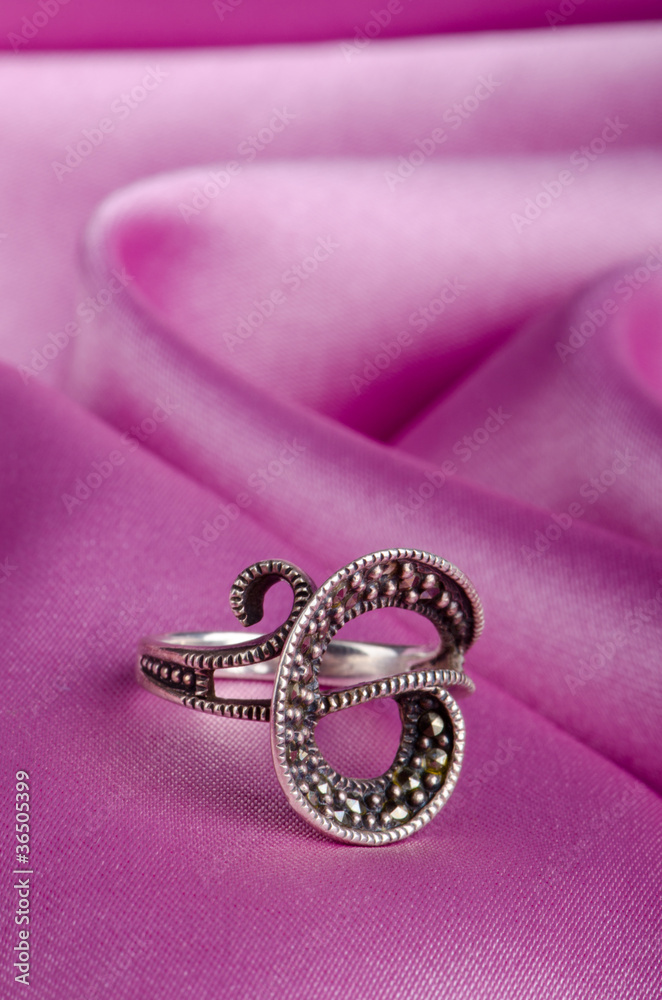 Fashion concept with ring on background Fashion concept with ring on background