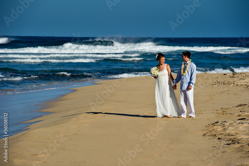Just Married. Beautiful young couple on the beach.