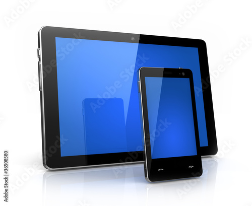 Modern digital pad and phone  with blue screen isolated photo