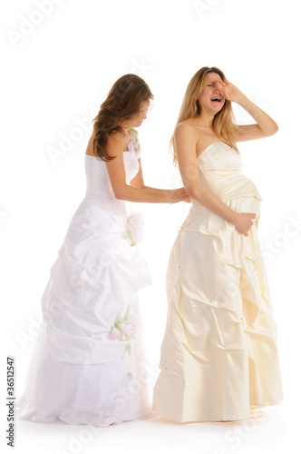 crying pregnant bride  with girlfriend