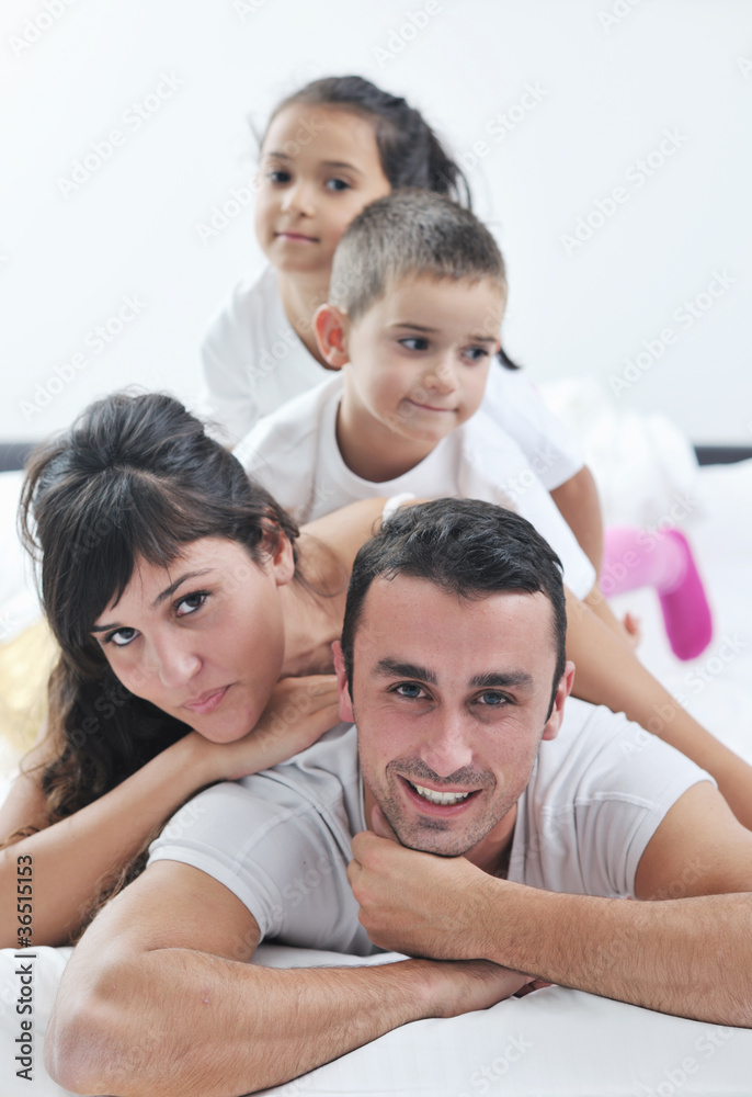 happy young Family in their bedroom