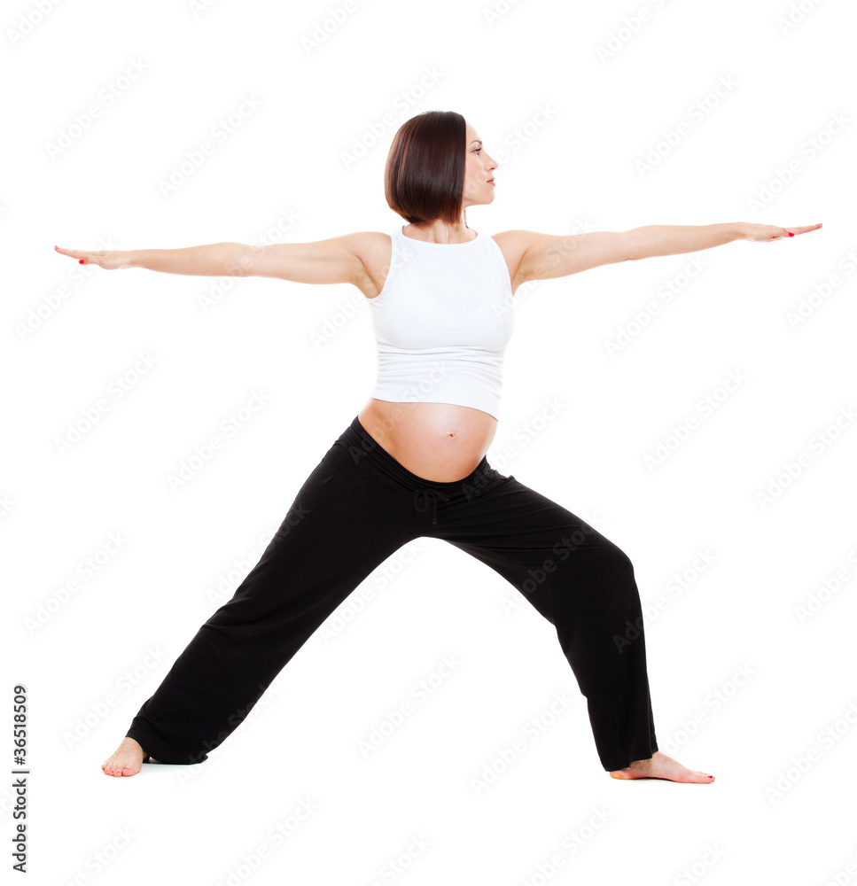 pregnant woman doing yoga exercises pregnant woman doing yoga exercises