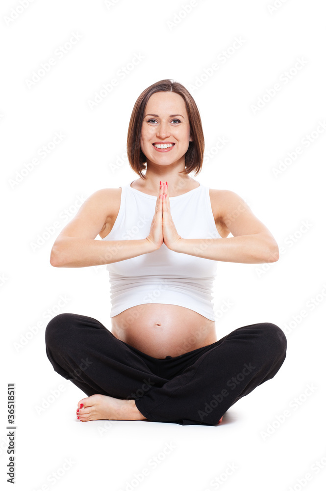 pregnant woman doing yoga meditating exercise pregnant woman doing yoga meditating exercise