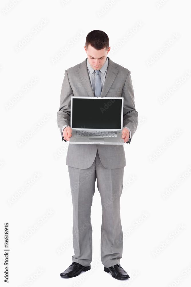 Portrait of a businessman looking at a laptop Portrait of a businessman looking at a laptop