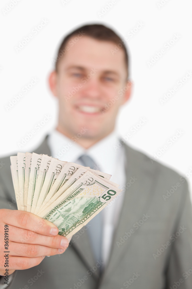 Portrait of a smiling businessman showing notes Portrait of a smiling businessman showing notes