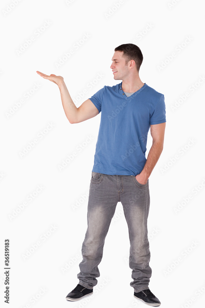 Portrait of a man holding something Portrait of a man holding something
