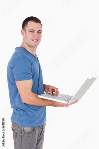 Portrait of a man using a laptop
