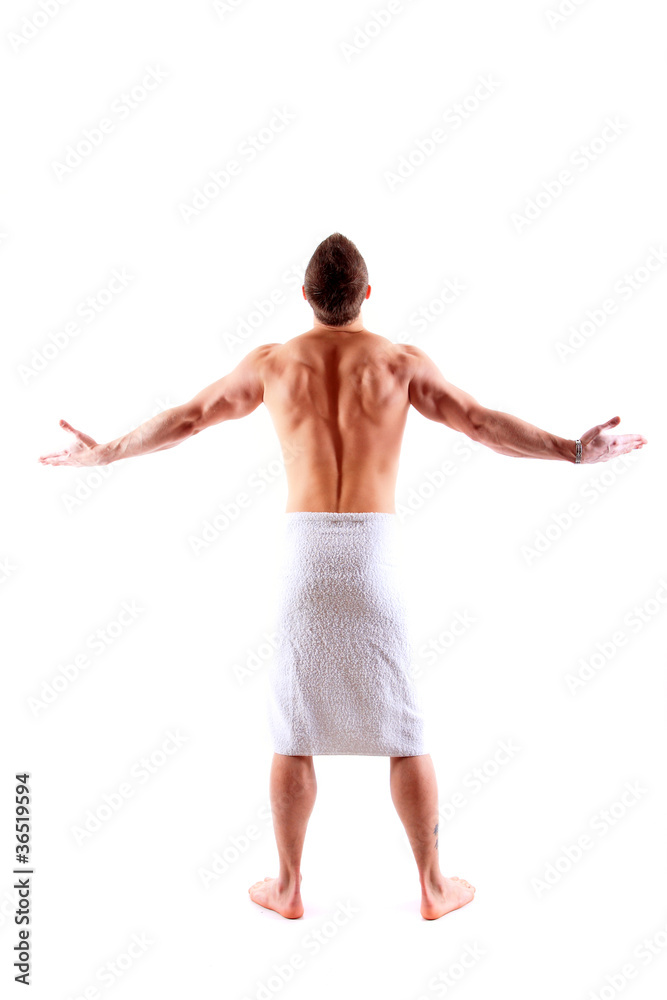 Handsome muscular man in towel Handsome muscular man in towel