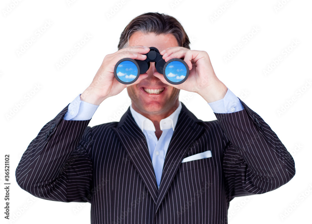 Smiling businessman using binoculars Smiling businessman using binoculars