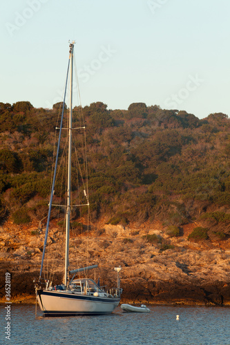 Sailboat At Sunrise - Giannutri Island, Italy photo