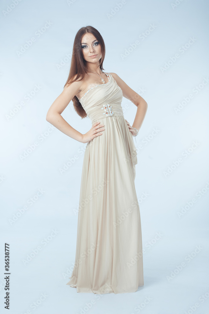 Beautiful woman with modern dress posing in studio Beautiful woman with modern dress posing in studio