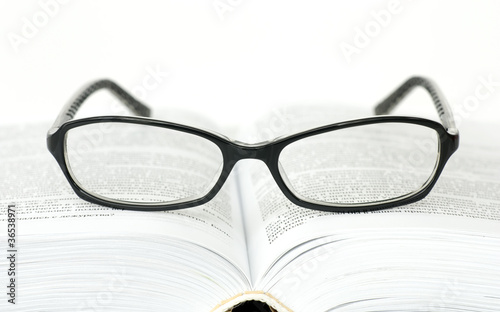 Glasses and book