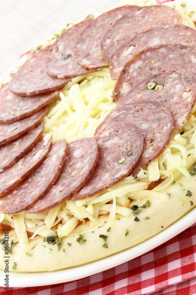 raw italian salami pizza raw italian salami pizza