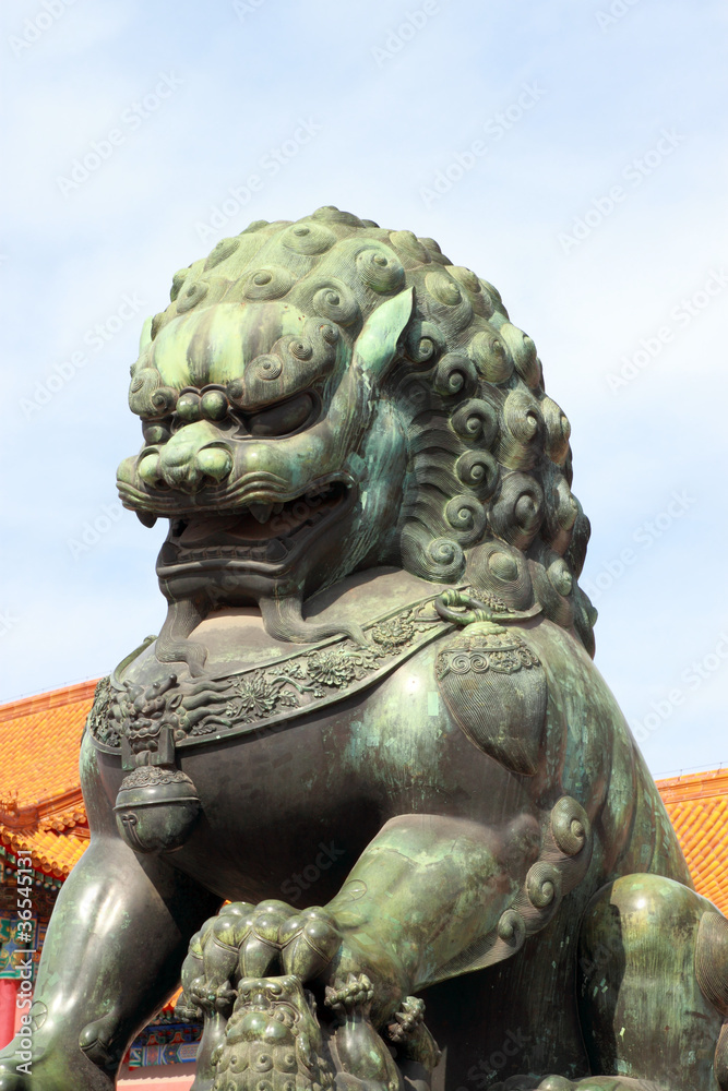 lion at entrance of The Forbidden City in Beijing, China