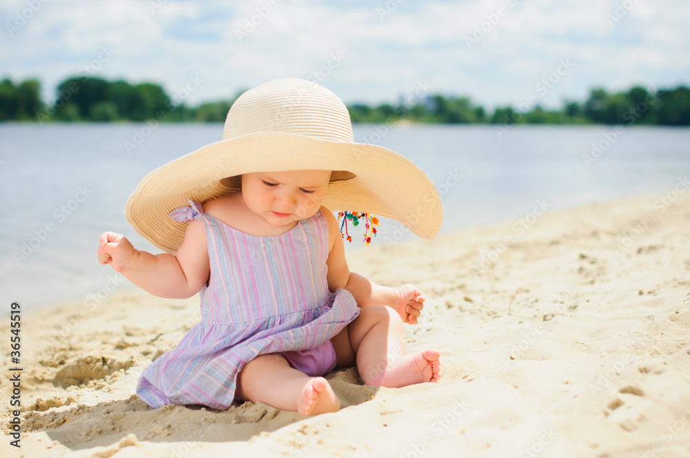 Little cute girl on the beach