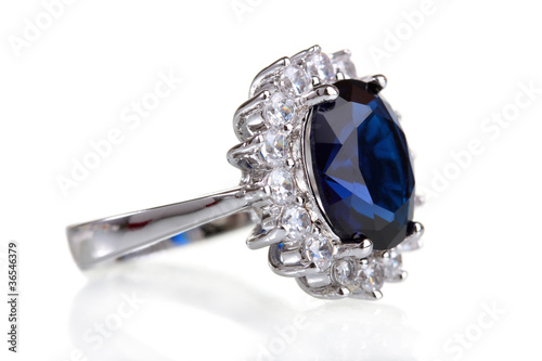 beautiful ring with blue gem isolated on white