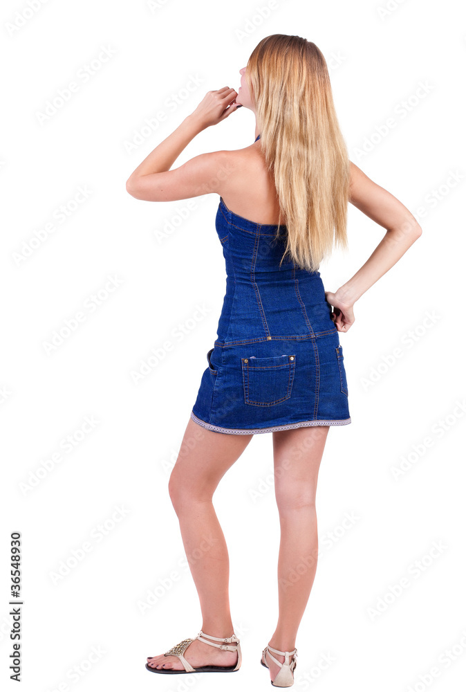 Back view of thinking young beautiful woman. Back view of thinking young beautiful woman.