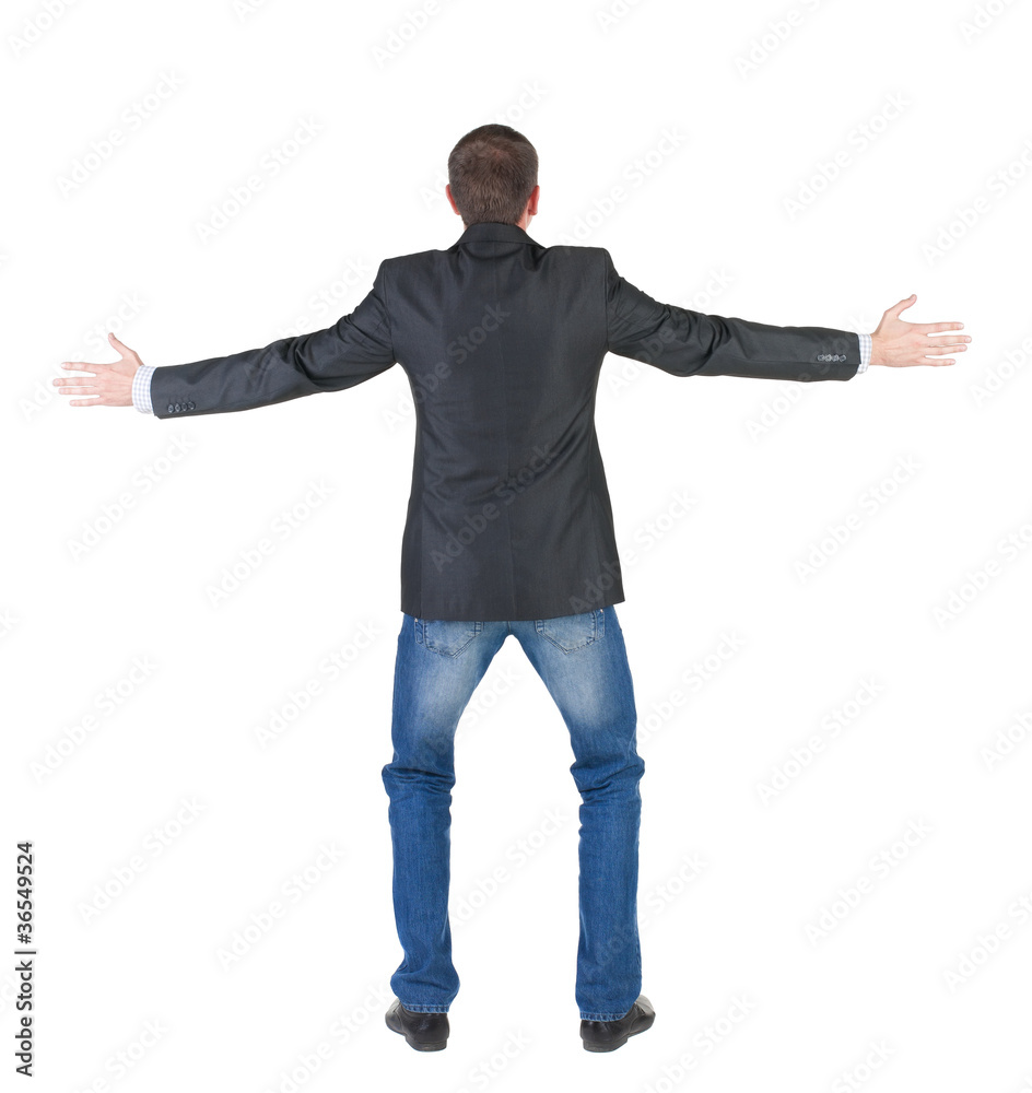 Back view of shocked and scared young business man. Holds hands Back view of shocked and scared young business man. Holds hands
