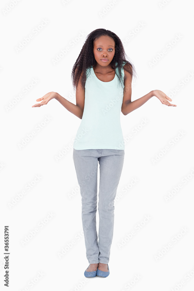 Woman having no idea on a white background Woman having no idea on a white background
