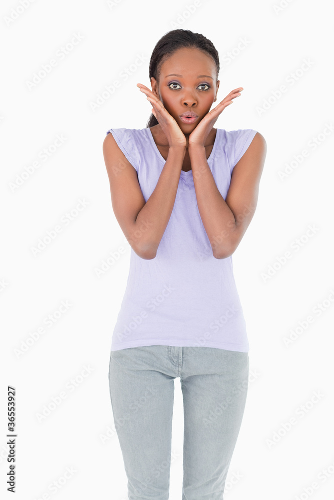 Close up of surprised woman on white background Close up of surprised woman on white background