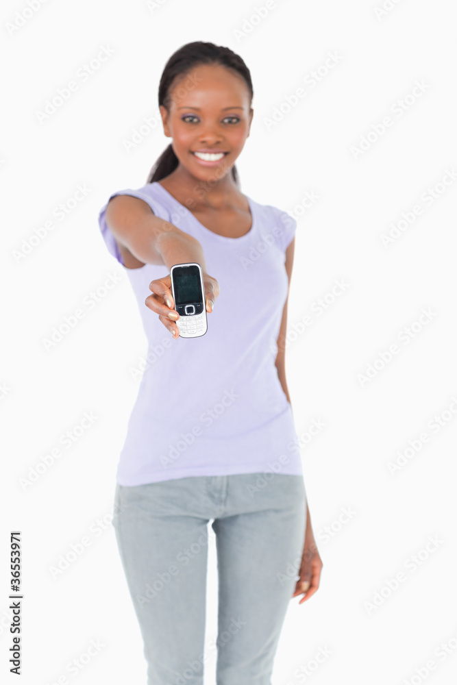 Close up of phone being presented by woman on white background Close up of phone being presented by woman on white background