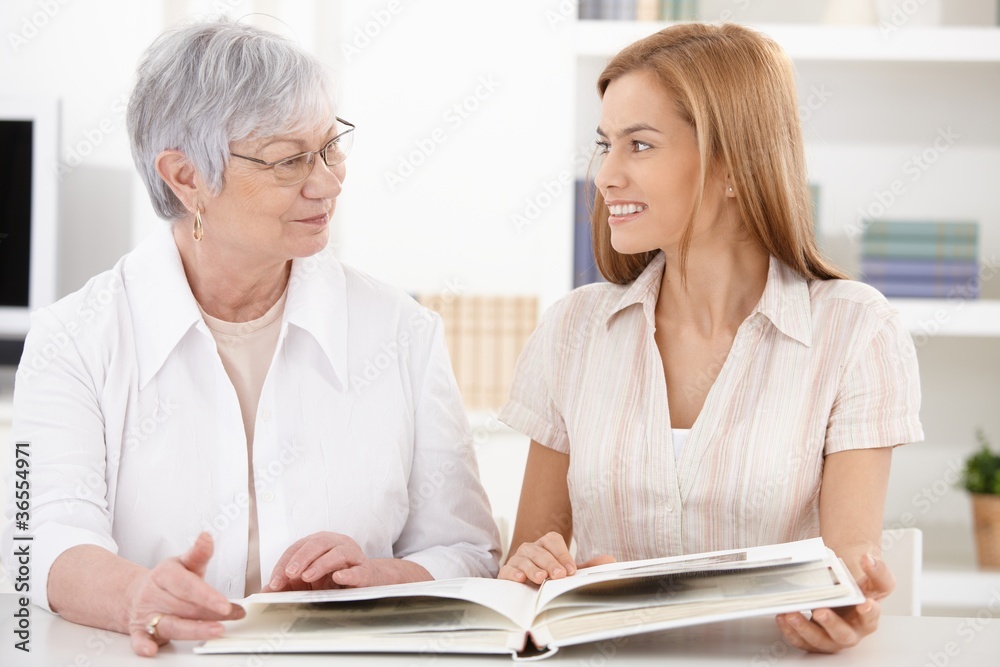 Young woman and grandmother having fun Young woman and grandmother having fun