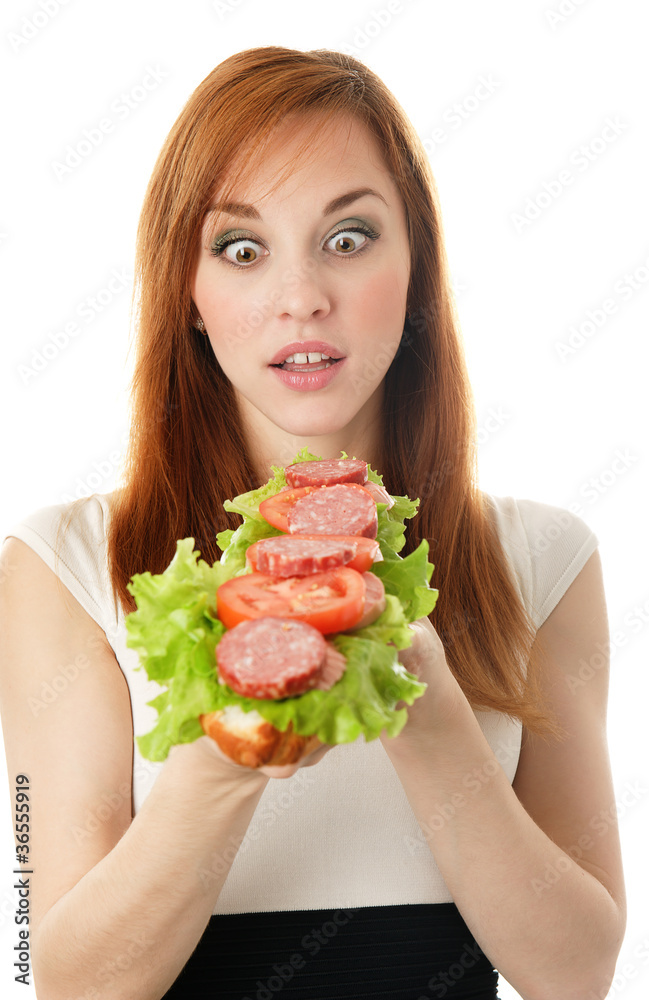 Young woman eating fast food. isolated on white Young woman eating fast food. isolated on white