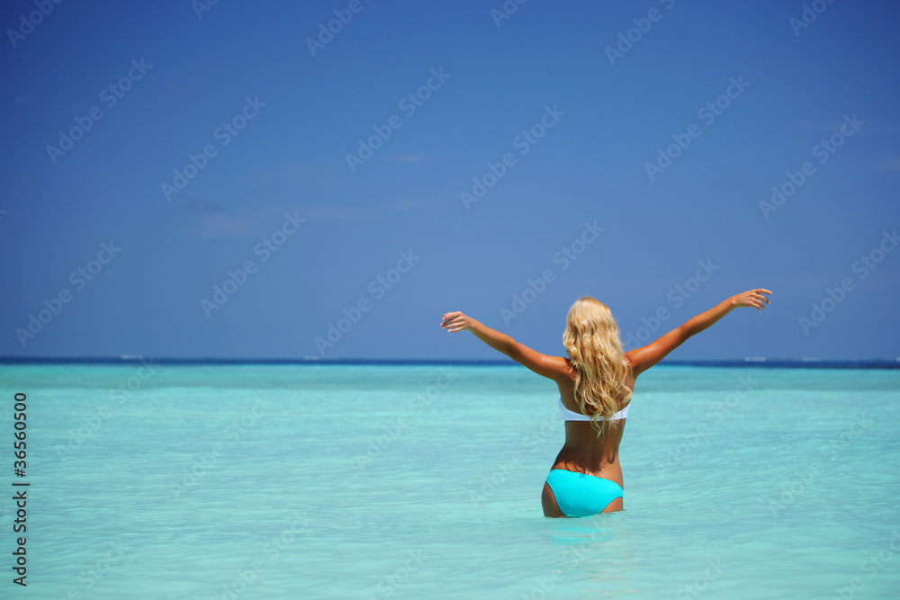 woman playing in water