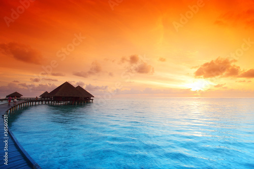 maldivian houses on sunrise #36560531