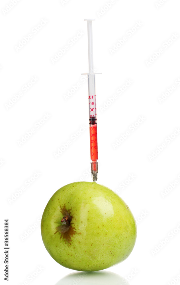 green apple and syringe isolated on white green apple and syringe isolated on white