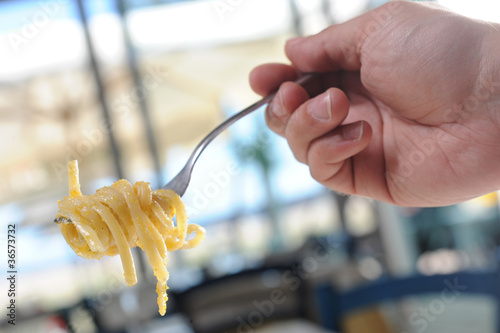 pasta forkful in a restaurant