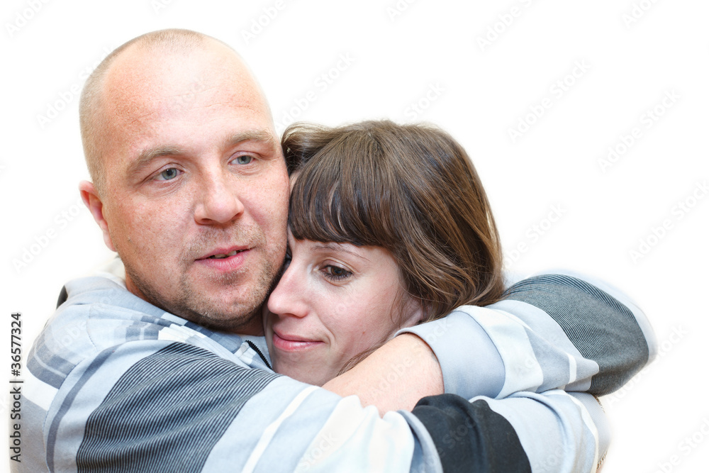 Man and woman a loving couple embracing together Man and woman a loving couple embracing together