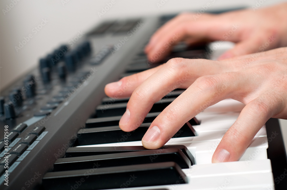 male hands playing the piano male hands playing the piano
