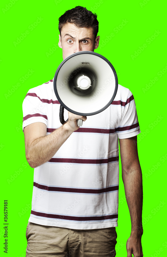 man with megaphone over removable chroma key background man with megaphone over removable chroma key background