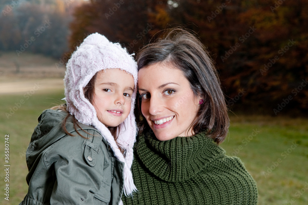 Obraz premium Happy mother and daughter in nature