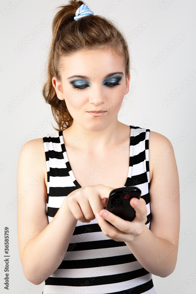 Portrait of woman with black phone. Girl texting with her phone. Portrait of woman with black phone. Girl texting with her phone.